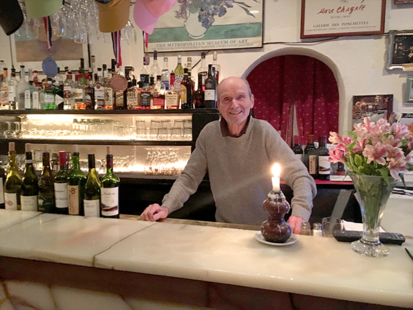 Henri Borel at the bar of his beloved Mad River Valley icon Chez Henri.